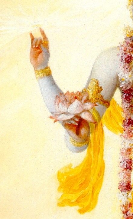 lord vishnu holding the sudarshana chakra and lotus flower